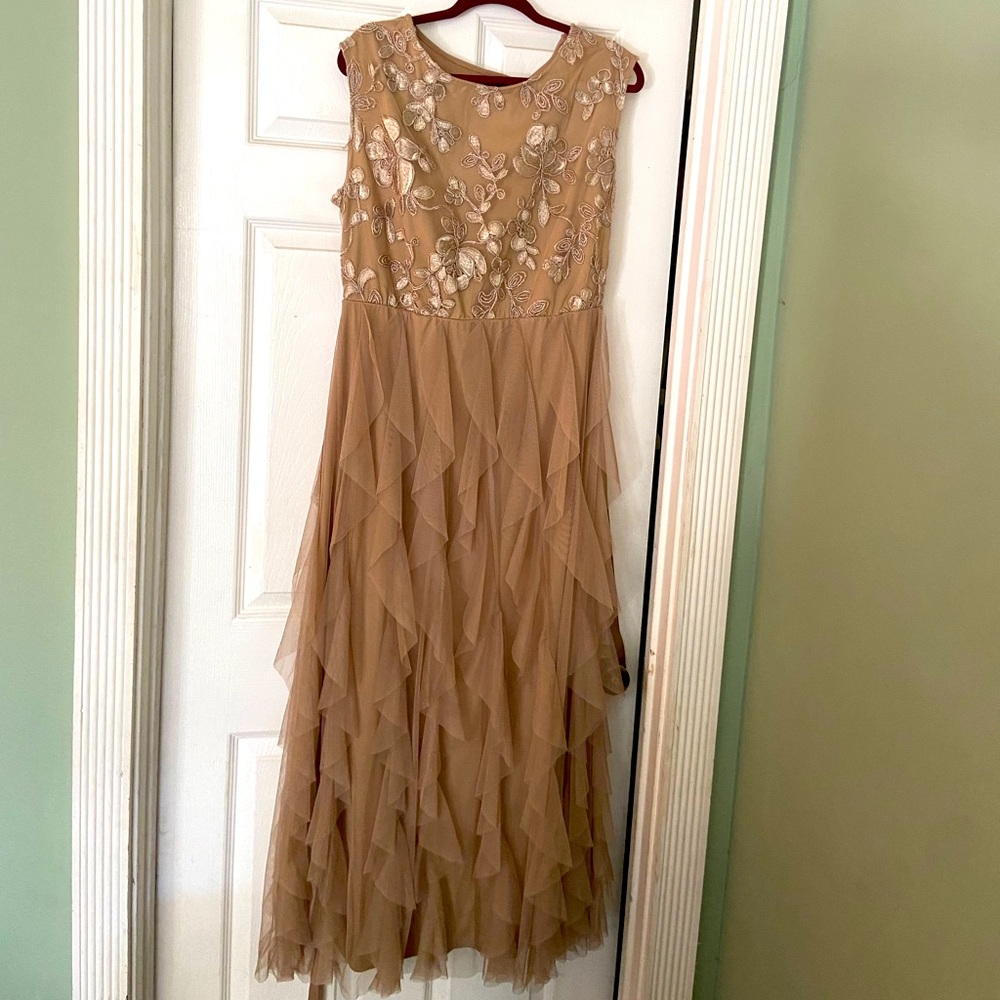 Beautiful ruffle skirt gown.